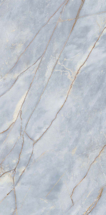 Lucca River Blue Lux 3D 60 × 120cm porcelain wall and floor tile, showcasing soft blue marble-effect tones with delicate warm veining and a luxurious polished stone-inspired finish.