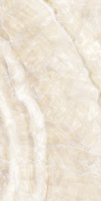 Flat lay of Lumen Precious Stone Ivory 60 × 120cm polished porcelain tiles, showcasing warm ivory and cream gemstone-inspired tones with layered crystalline detailing, soft translucent movement, delicate natural veining, and a reflective high-gloss finish for a luxurious statement surface.