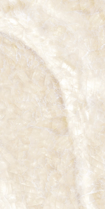 Flat lay of Lumen Precious Stone Ivory 60 × 120cm polished porcelain tiles, showcasing warm ivory and cream gemstone-inspired tones with layered crystalline detailing, soft translucent movement, delicate natural veining, and a reflective high-gloss finish for a luxurious statement surface.