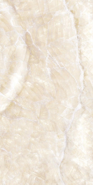 Flat lay of Lumen Precious Stone Ivory 60 × 120cm polished porcelain tiles, showcasing warm ivory and cream gemstone-inspired tones with layered crystalline detailing, soft translucent movement, delicate natural veining, and a reflective high-gloss finish for a luxurious statement surface.