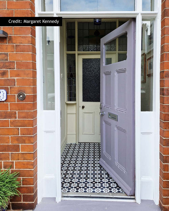 Madeira Antique Gold 20cm x 20cm Moroccan style wall and floor tiles, featuring a striking black and white geometric pattern, used across this period hallway floor to create a characterful entrance that complements the original architectural details.
