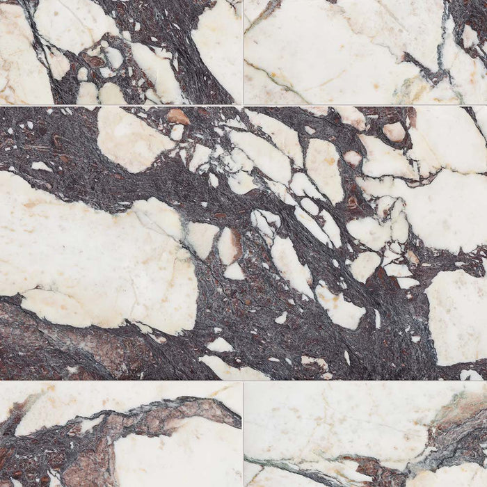 Fayrouz Viola 30.5x61cm natural marble tiles with a honed finish, installed in a staggered layout, showcasing a white base with bold burgundy and warm-toned veining, highlighting natural variation and striking stone detail.