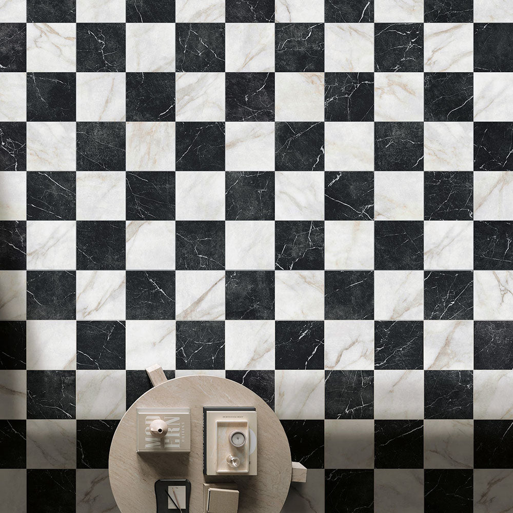 Chequerboard floor featuring Vitoria Classic Bianco white marble-style porcelain tiles in a 30 × 30cm format, combining soft white and deep black marble-effect squares to create a bold, timeless pattern, styled with neutral décor for a classic yet contemporary look.