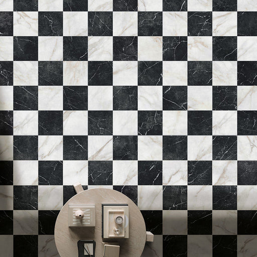 Chequerboard floor featuring Vitoria Classic Bianco white marble-style porcelain tiles in a 30 × 30cm format, combining soft white and deep black marble-effect squares to create a bold, timeless pattern, styled with neutral décor for a classic yet contemporary look.