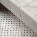 Bathroom detail featuring Fayrouz Black & White basketweave mosaic natural marble tiles with a honed finish, showcasing an intricate woven pattern with dark accents, installed alongside matching marble tiles for a cohesive, classic look.