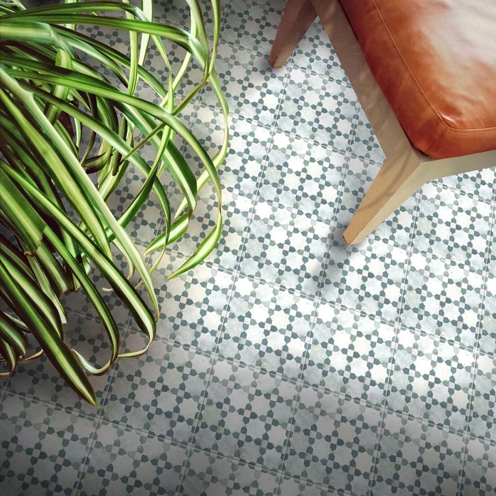 Floor featuring Berber Mequinez Green 15x15cm Moroccan-Style porcelain tile, featuring a green geometric pattern.