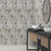 Bathroom interior featuring Meadow Flowers Decor 60 × 120cm porcelain wall tiles, styled with a vanity unit, twin basins, marble worktop, and soft botanical pattern for a delicate, nature-inspired finish.