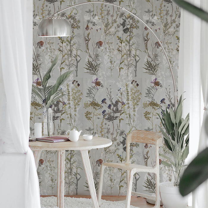 Interior corner featuring Meadow Flowers Decor 60 × 120cm porcelain wall tiles, styled with a small dining table, wooden chair, indoor plants, and soft natural light for a calm, nature-inspired setting.