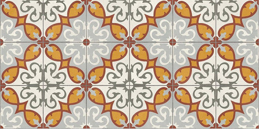 Close-up of Mediterraneo Gela 2cm patterned outdoor slabs 50 × 100cm, featuring a decorative Mediterranean-inspired pattern in terracotta, grey, white, and soft yellow tones with a vintage-style geometric finish.