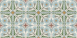 Close-up of Mediterraneo Olbia 2cm patterned outdoor slabs 50 × 100cm, featuring a decorative Mediterranean-inspired floral pattern in soft blue, green, grey, and terracotta tones with a weathered vintage-style finish.