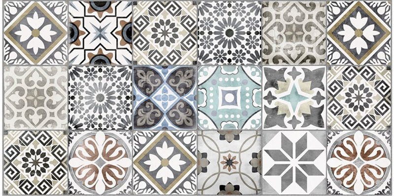 Close-up of Mediterraneo Patchwork 2cm patterned outdoor slabs 50 × 100cm, featuring a decorative patchwork-inspired mix of geometric and floral patterns in soft blue, grey, beige, cream, and terracotta tones.