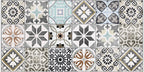 Close-up of Mediterraneo Patchwork 2cm patterned outdoor slabs 50 × 100cm, featuring a decorative patchwork-inspired mix of geometric and floral patterns in soft blue, grey, beige, cream, and terracotta tones.
