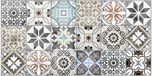 Close-up of Mediterraneo Patchwork 2cm patterned outdoor slabs 50 × 100cm, featuring a decorative patchwork-inspired mix of geometric and floral patterns in soft blue, grey, beige, cream, and terracotta tones.