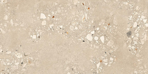 Close-up of Melange Sand Cosmo Stone wall and floor tiles 60 × 120cm, featuring warm sand-toned stone-effect detailing with terrazzo-inspired aggregate texture, subtle tonal variation, and a refined contemporary matt finish.