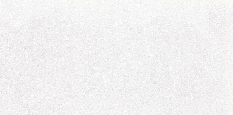 Close-up of Melody Cement White 30 × 60cm concrete-effect porcelain tiles, featuring soft white tones with a subtle cement-inspired texture for a clean, minimalist finish suited to contemporary interiors.
