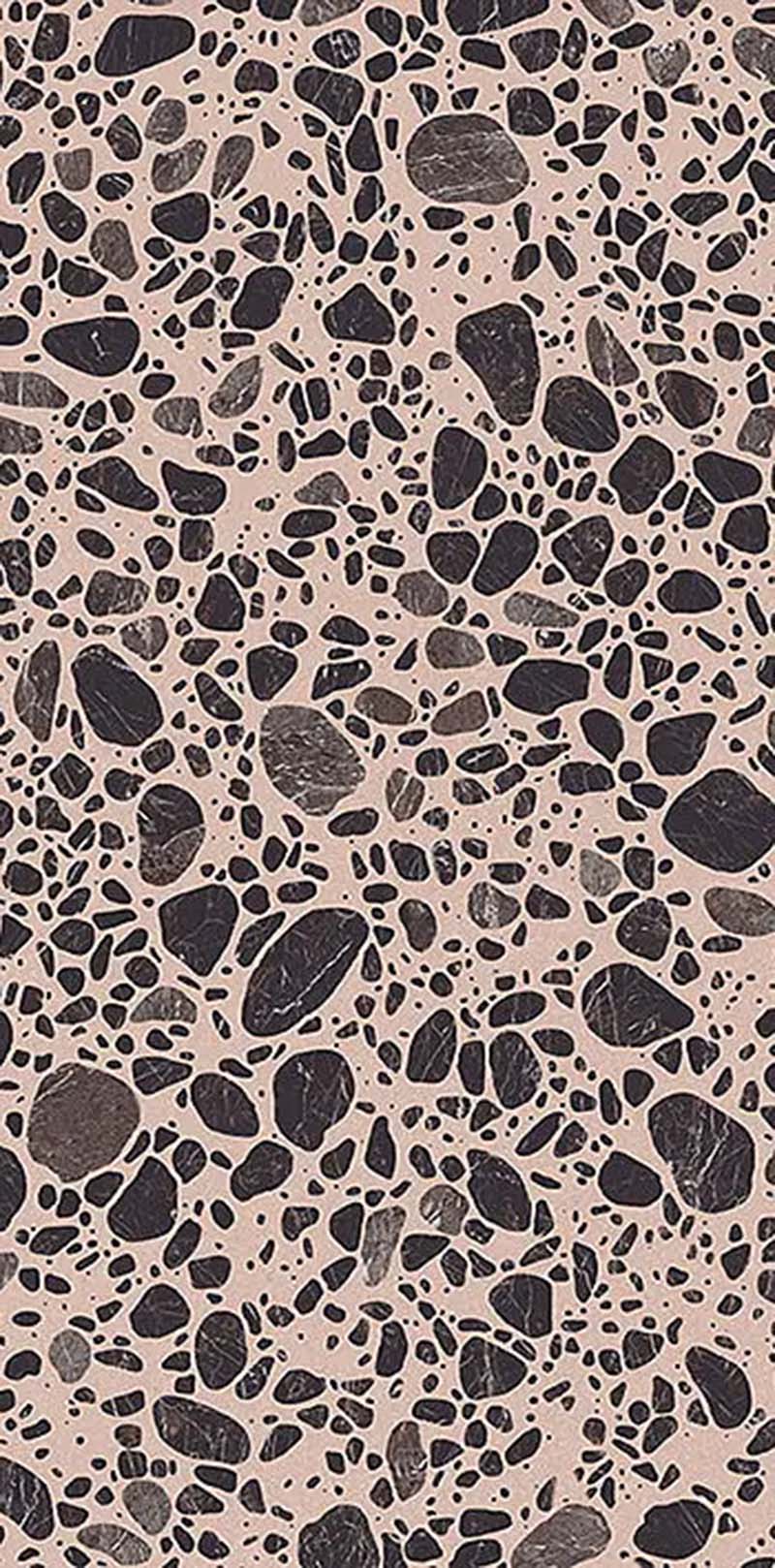 Close-up of Melody Pop Pink 60cm x 120cm terrazzo effect porcelain tile, featuring a soft pink background with black and grey stone-inspired aggregates for contemporary wall and floor designs.