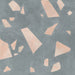Close-up of Melody ROCK Terrazzo Green 60 × 60cm terrazzo-effect porcelain tiles, featuring oversized blush pink marble-style fragments set against a deep green-grey base for a bold contemporary statement finish.
