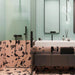 Contemporary bathroom featuring Melody Rock Pink 60cm x 120cm terrazzo effect porcelain wall and floor tiles, paired with mint green fluted wall tiles, black brassware, floating vanity and a walk-in shower.