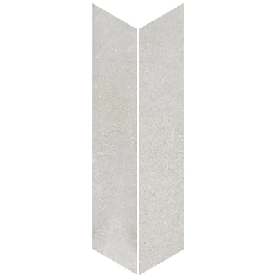 Product display of Monzo Stone Chevron Silver 10x53cm stone-effect porcelain chevron tiles in soft silver-grey tones, featuring subtle texture and natural tonal variation with a contemporary stone-inspired finish.