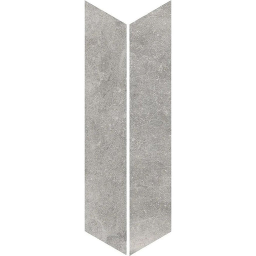 Product display of Monzo Stone Chevron Titanium 10x53cm stone-effect porcelain chevron tiles in soft grey tones, featuring subtle texture and natural tonal variation with a contemporary stone-inspired finish.