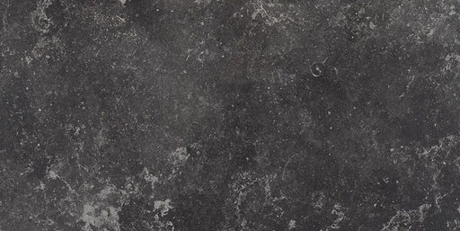 Product display of Monzo Stone Nite 30x60cm dark stone-effect porcelain tiles in deep charcoal tones, featuring subtle texture, soft tonal variation and delicate veining inspired by natural stone surfaces.