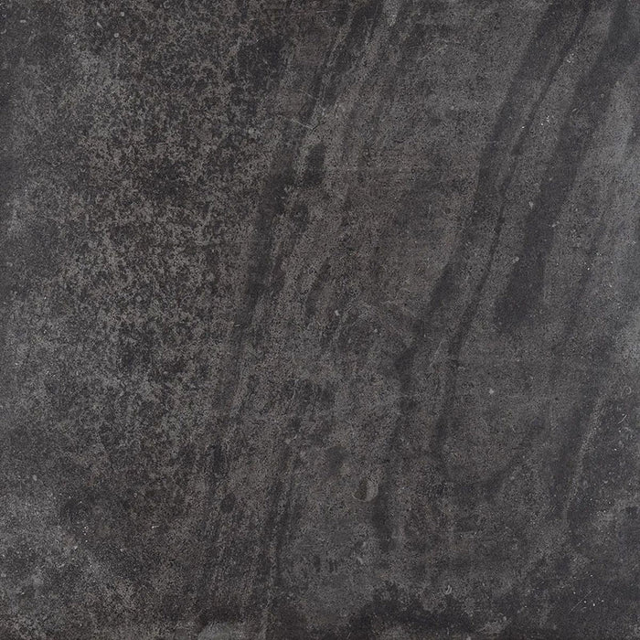 Product display of Monzo Stone Nite 60x60cm dark stone-effect porcelain tiles in deep charcoal tones, featuring dramatic tonal variation, textured detailing and natural stone-inspired movement across the surface.