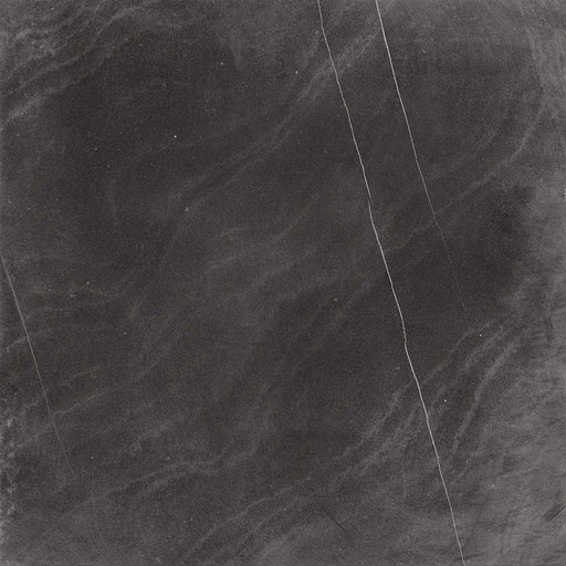 Product display of Monzo Stone Nite 60x60cm dark stone-effect porcelain tiles in deep charcoal tones, featuring dramatic tonal variation, textured detailing and natural stone-inspired movement across the surface.