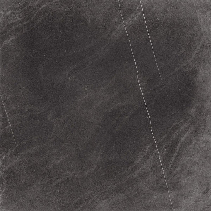 Product display of Monzo Stone Nite 60x60cm dark stone-effect porcelain tiles in deep charcoal tones, featuring dramatic tonal variation, textured detailing and natural stone-inspired movement across the surface.