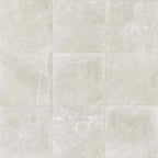 Product display of Monzo Stone Silver 60x60cm stone-effect porcelain tiles in soft silver-grey tones, featuring delicate veining, subtle texture, and natural tonal variation with a contemporary stone-inspired finish.