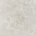 Product display of Monzo Stone Silver 60x60cm stone-effect porcelain tiles in soft silver-grey tones, featuring delicate veining, subtle texture, and natural tonal variation with a contemporary stone-inspired finish.