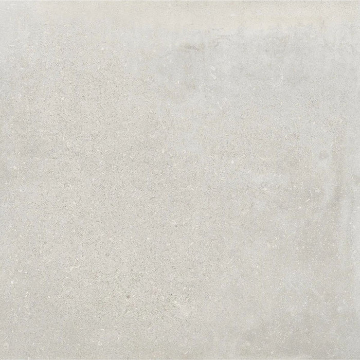 Product display of Monzo Stone Silver 60x60cm stone-effect porcelain tiles in soft silver-grey tones, featuring delicate veining, subtle texture, and natural tonal variation with a contemporary stone-inspired finish.
