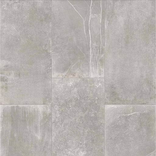 Product display of Monzo Stone Titanium 30x60cm stone-effect porcelain tiles in soft grey tones, featuring subtle texture, layered veining, and tonal variation with a natural stone-inspired finish.