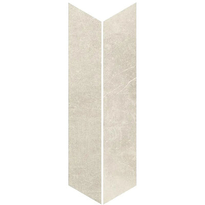 Product display of Monzo Stone Chevron Sand 10x53cm chevron porcelain tiles in soft warm beige tones, featuring subtle stone-effect texture, delicate veining and a contemporary geometric chevron shape inspired by natural stone surfaces.