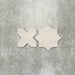Close-up of Muscat Avorio Rocks Star and Cross wall and floor tiles, showcasing coordinating geometric shapes, soft ivory tones, subtle speckled detailing and a textured stone-effect finish.