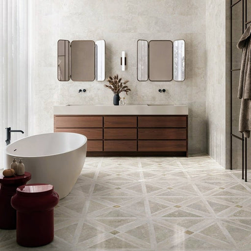 Bathroom featuring Nucetto Travertine Decor 60x60cm wall and floor tiles, showcasing a geometric travertine effect pattern, paired with matching travertine effect wall tiles, a freestanding bath, timber vanity unit and contemporary black accents.
