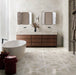 Bathroom featuring Nucetto Travertine Decor 60x60cm wall and floor tiles, showcasing a geometric travertine effect pattern, paired with matching travertine effect wall tiles, a freestanding bath, timber vanity unit and contemporary black accents.