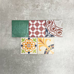 Fayrouz Mini Patchwork 15×15cm Moroccan-style porcelain tiles displayed as a mixed patchwork layout, showcasing a vibrant collection of geometric and floral designs in green, blue, pink, mustard, terracotta and neutral tones.