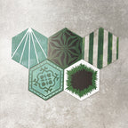 Fayrouz Verde Hexagon Patchwork Moroccan-style porcelain tiles in an 18.7 × 21.6cm hexagon format, showcasing a coordinated mix of geometric, starburst and zigzag patterns in layered green, sage, mint and charcoal tones, arranged as a decorative patchwork group to highlight colour variation and pattern diversity.