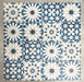 Souk Blue C 20×20cm Moroccan-style porcelain patchwork tiles featuring mixed blue, white and grey geometric patterns.