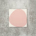 Pebbles Reversed Pink 20x20cm porcelain Moroccan-style tiles featuring soft blush abstract shapes on a warm white background, designed to create playful statement walls and contemporary patterned interiors.
