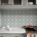 Persia Kashan MINI 15cm x 15cm Moroccan style tiles, showcasing an intricate repeating geometric pattern in blue, turquoise and warm neutral tones across the kitchen splashback, paired with soft grey cabinetry and brass details.