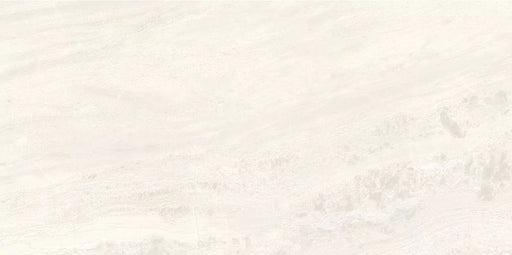 Close-up of Petra Avorio Ivory stone marble effect porcelain wall and floor tiles in a 60cm x 120cm format, showcasing soft ivory, cream and light beige veining with subtle natural stone-inspired movement, creating a bright and elegant surface for bathrooms, kitchens, living spaces and commercial interiors.