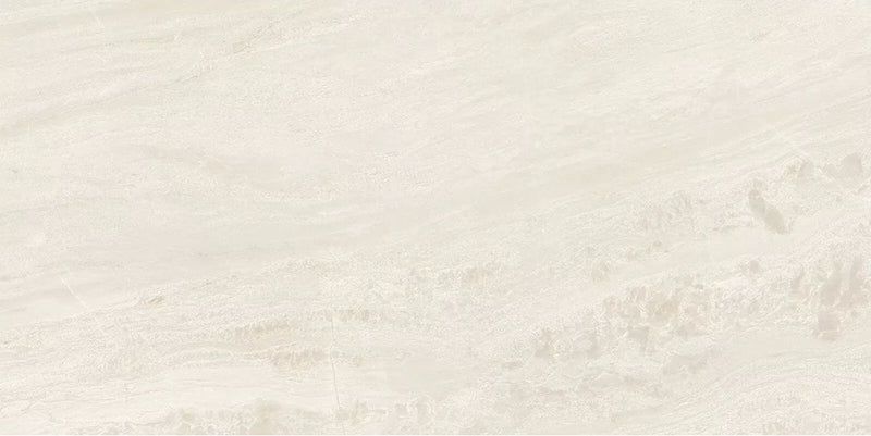 Close-up of Petra Beige stone marble effect porcelain wall and floor tiles in a 60cm x 120cm format, showcasing warm beige, ivory and soft cream veining with subtle natural stone-inspired movement, creating a timeless and elegant surface for bathrooms, kitchens, living spaces and commercial interiors.