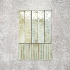 Product display of Pottery Decor Agave Green 12.5x25cm ceramic wall tiles in soft green tones, featuring a handcrafted glossy finish with coordinating fluted decorative tiles for textured contemporary interiors.