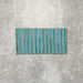 Product display of Pottery Decor Azul Blue 12.5x25cm ceramic wall tiles in vibrant blue tones, featuring a linear fluted design, handcrafted glossy finish and subtle tonal variation for textured contemporary interiors.