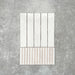Product display of Pottery Decor Blanco 12.5x25cm ceramic wall tiles in soft white tones, featuring a handcrafted glossy finish with coordinating fluted decorative tiles for textured contemporary interiors.