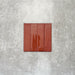 Product image of Puzzle Coral Brick Rectified 5x20cm wall and floor tiles, featuring a glossy coral finish with rich tonal variation and softly aged edges, displayed to highlight the tile's handcrafted character.