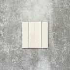Product image of Puzzle White Brick Rectified 5x20cm wall and floor tiles, featuring a glossy white finish with subtle tonal variation, displayed in a brick format to showcase the tile's handcrafted appearance.