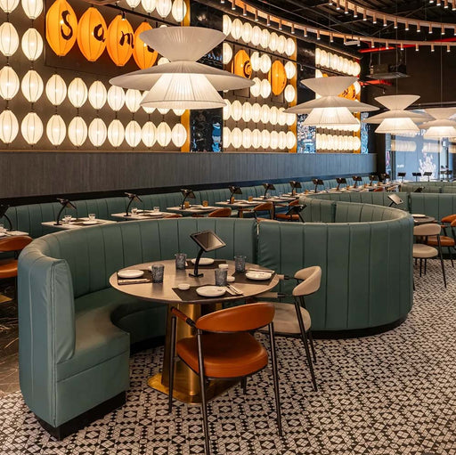 Restaurant interior featuring Abbey Black & White A 28×28cm Victorian-style patterned porcelain mosaic floor tiles.