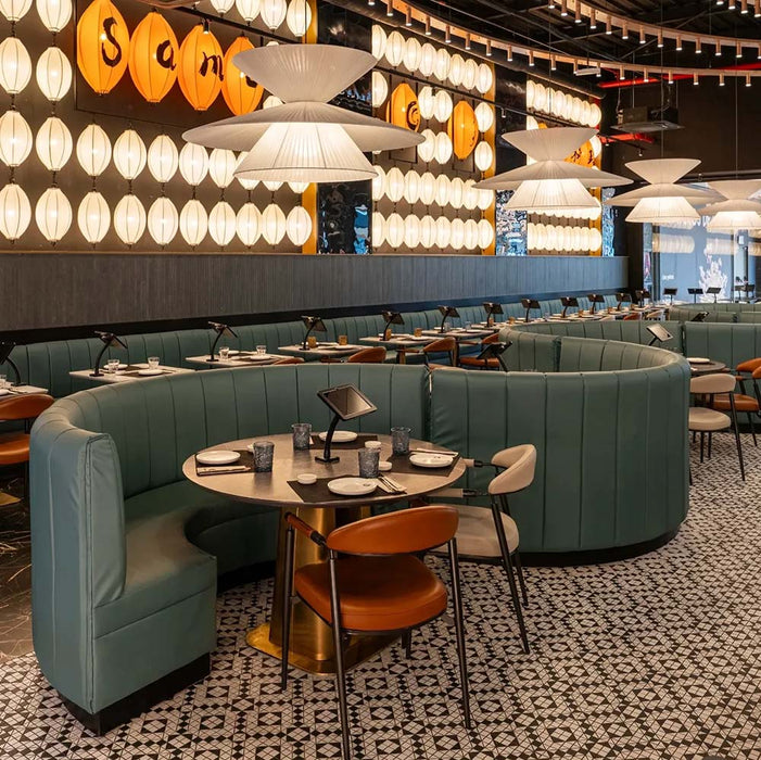 Restaurant interior featuring Abbey Black & White A 28×28cm Victorian-style patterned porcelain mosaic floor tiles.